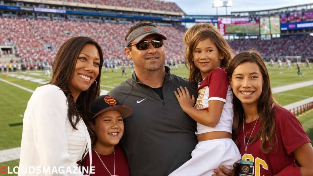 Stephanie and Steve Sarkisian child